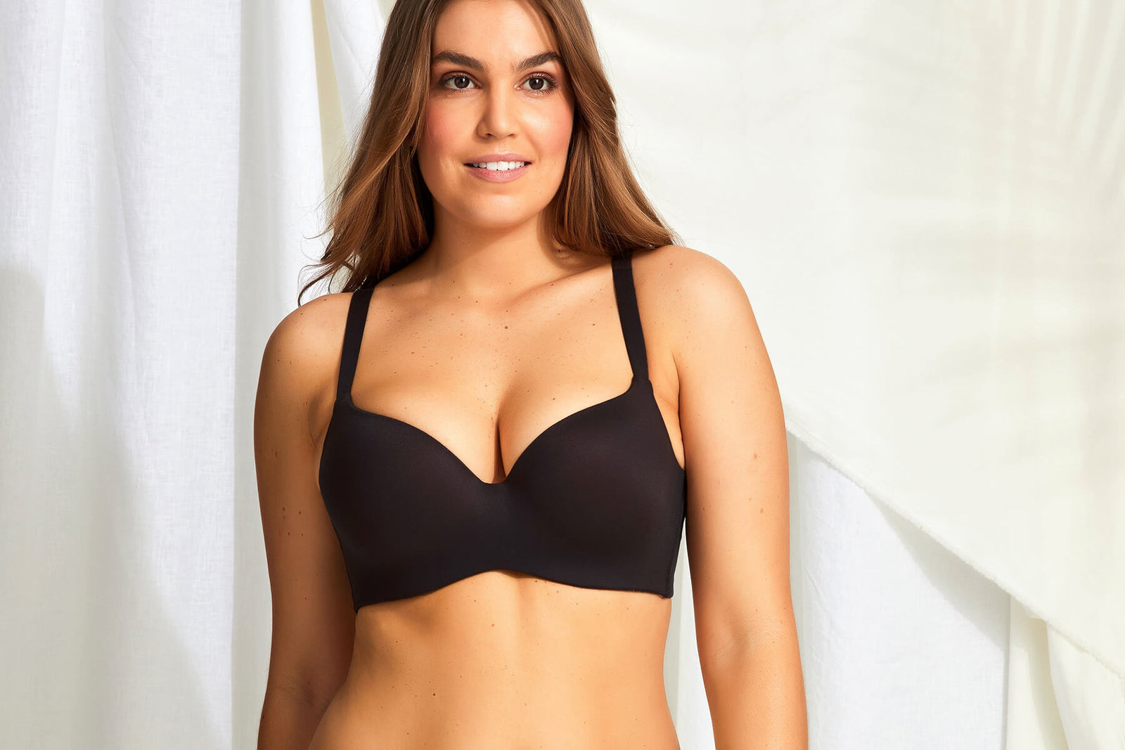 Woman wearing black bra