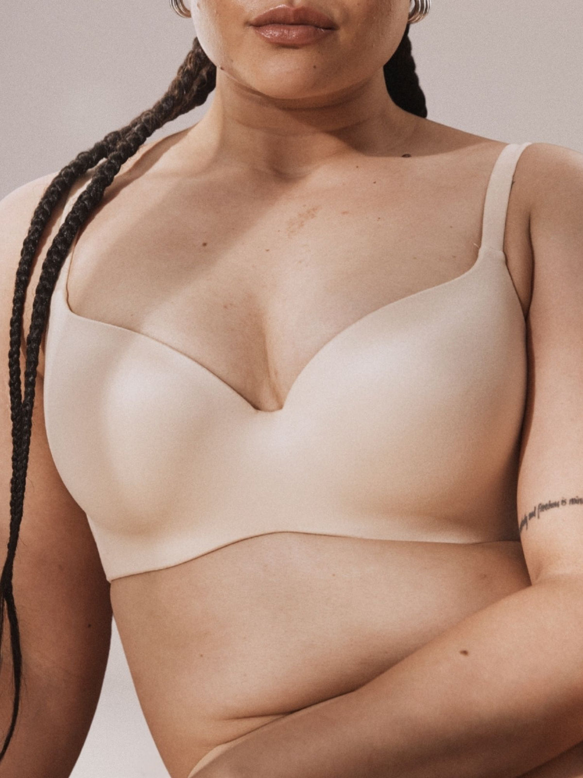 Model wearing the Memory Blessed Full Coverage D+ Bra in Beige Nude by Fine Lines Lingerie
