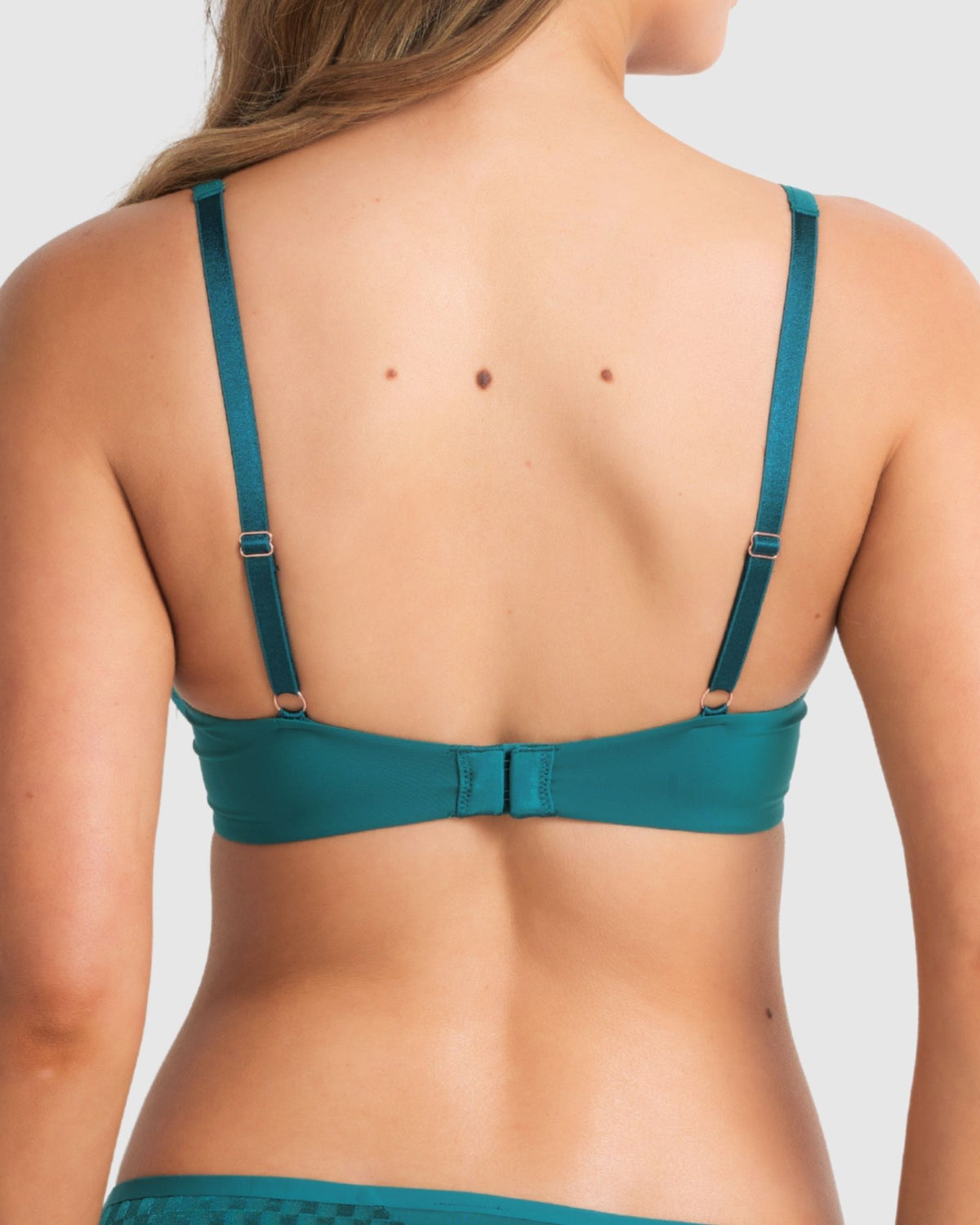 Back view of the Pacific Green plunge bra with adjustable straps and hook closure.