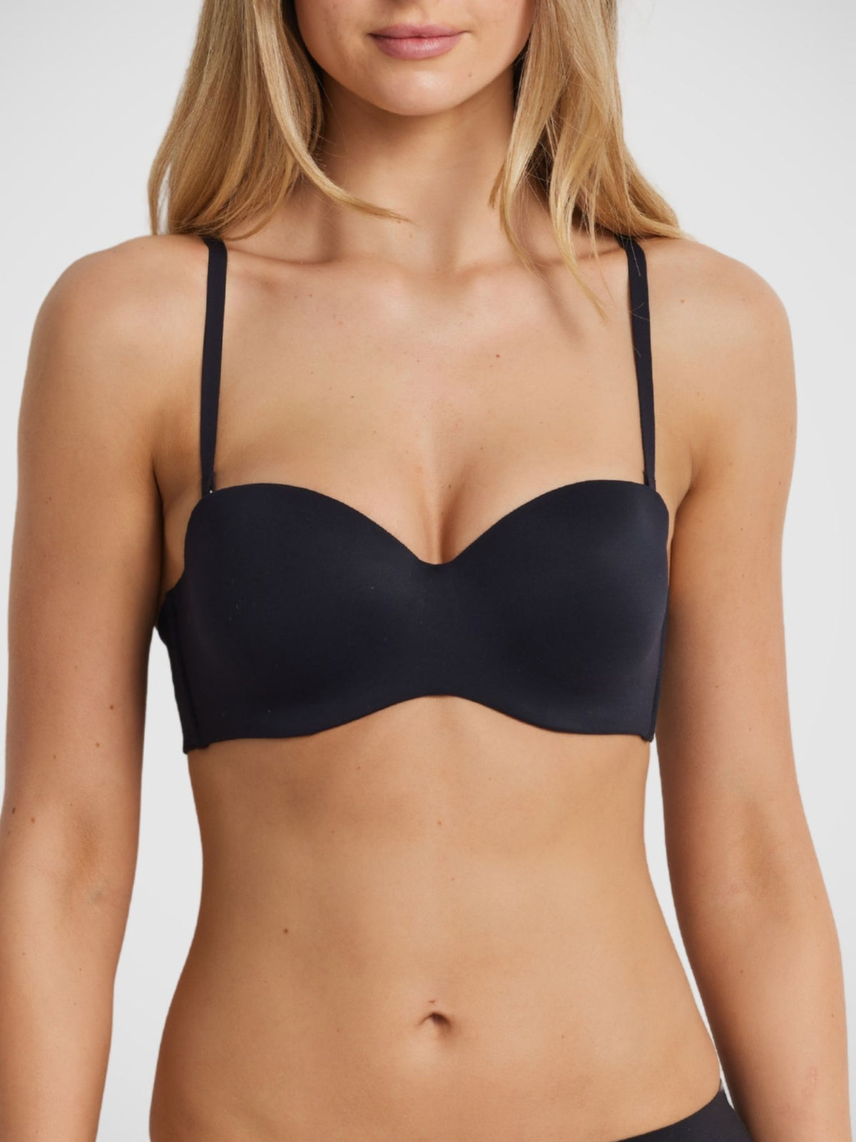 Memory Strapless Bra in Black regular strap configuration front view, convertible strapless bra, model Milla