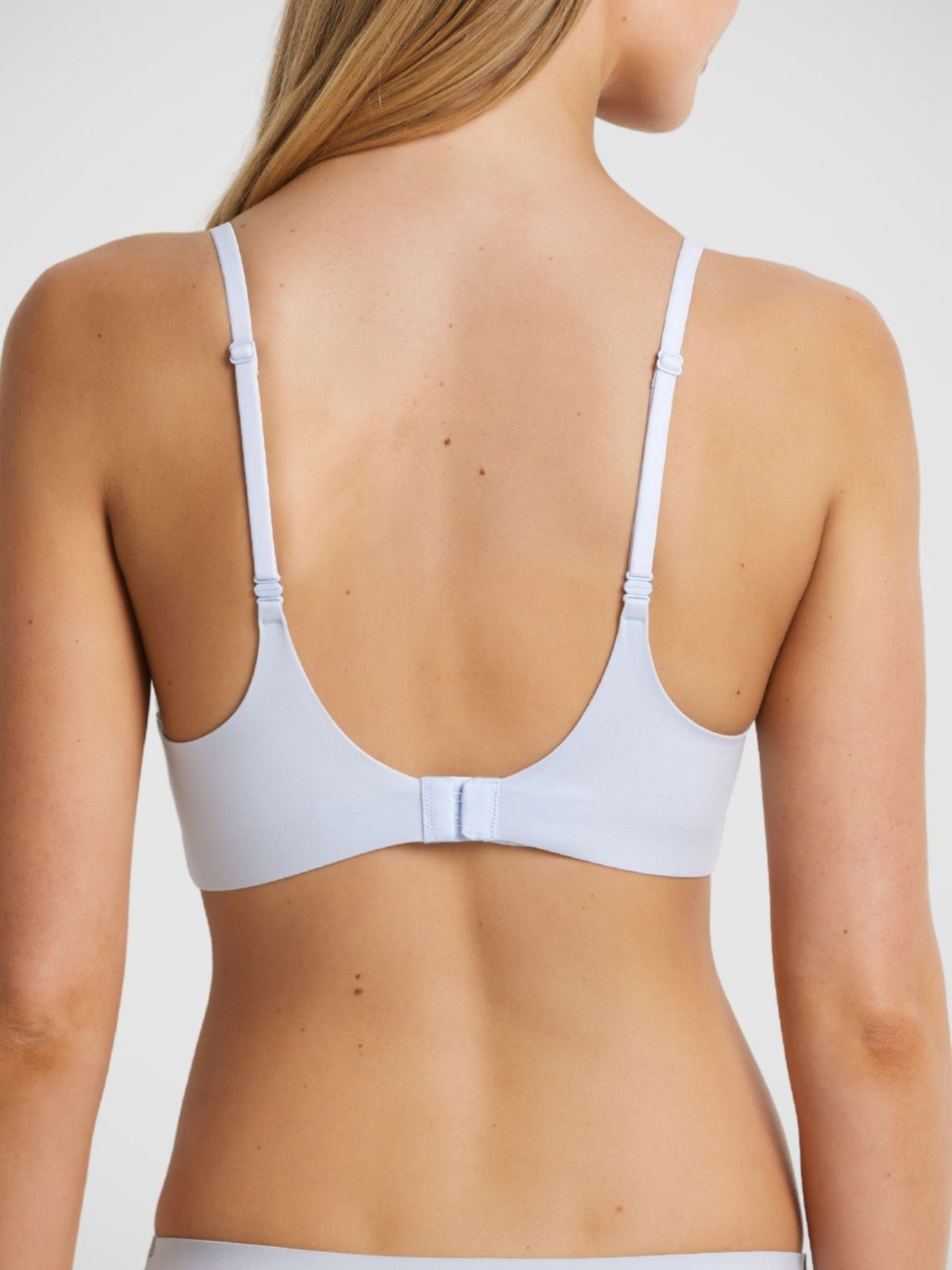 Ultrasoft Plunge Wirefree Bra in Baby Blue, adjustable straps and hook and eye back closure, rear view