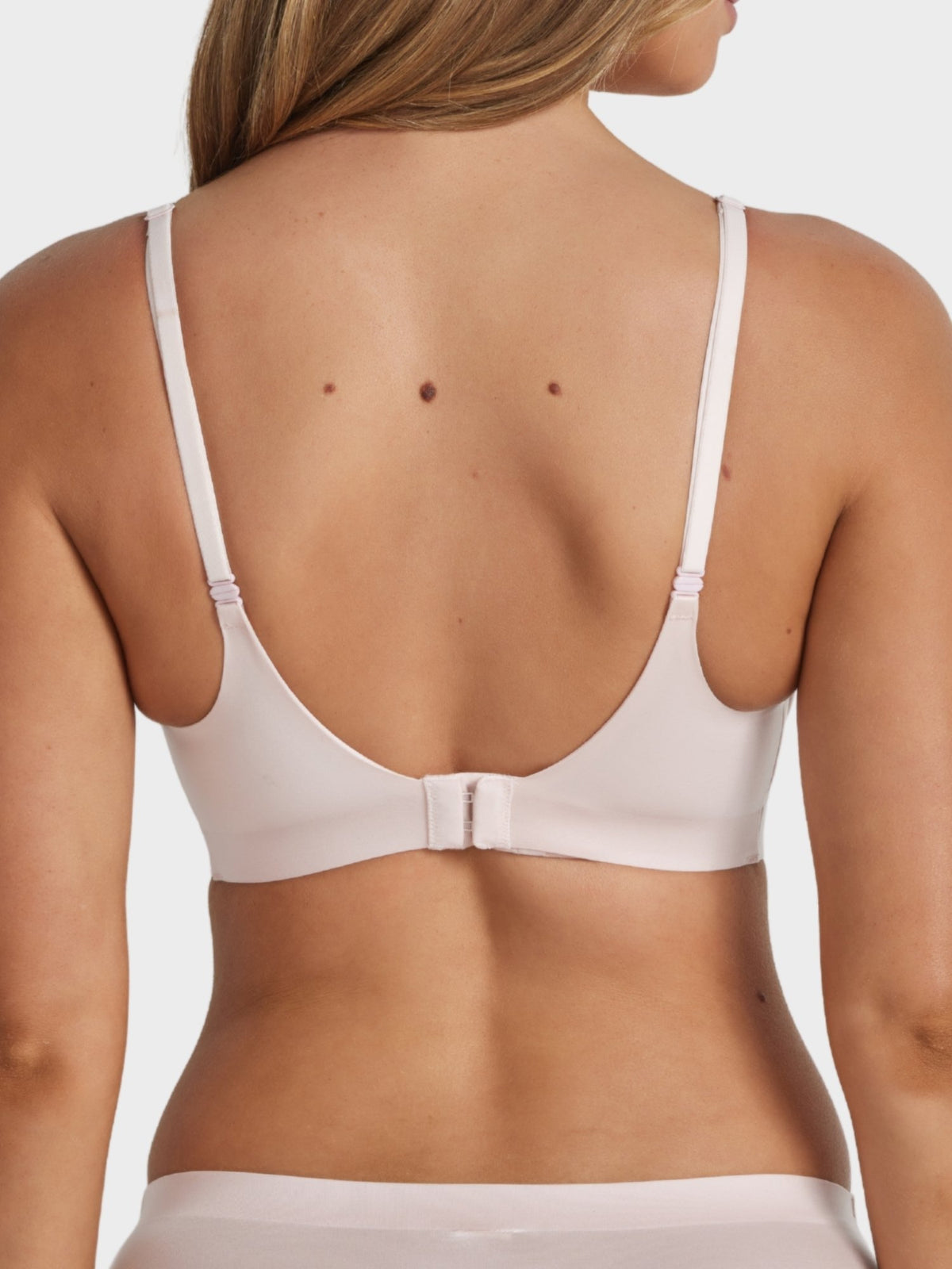 Back view of soft pink Fine Lines Ultrasoft Plunge Wirefree Bra with adjustable straps