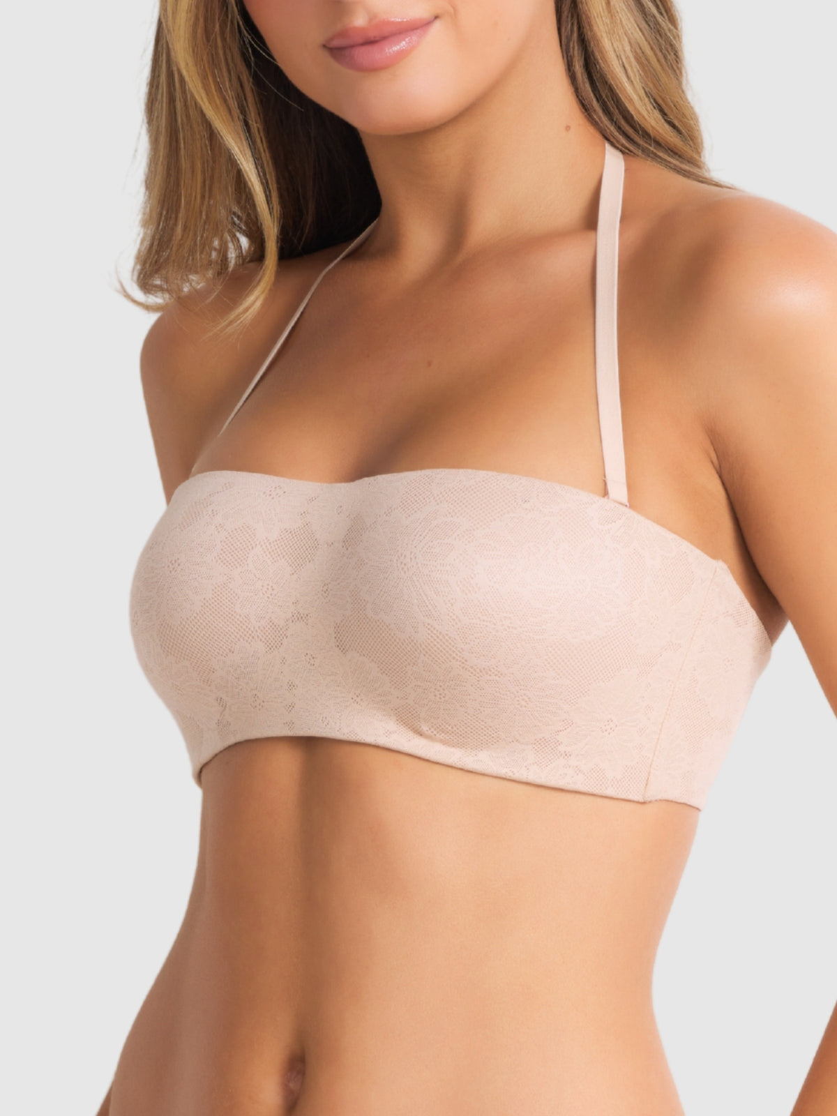 Side profile of the strapless bra worn halterneck style, showing smooth fused finishes and silhouette.