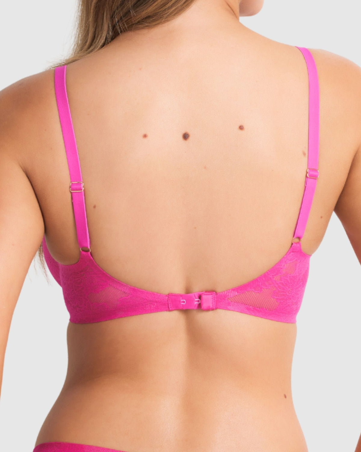 Back view of the lace bra, showcasing the hook-and-eye closure and fine lace detail.