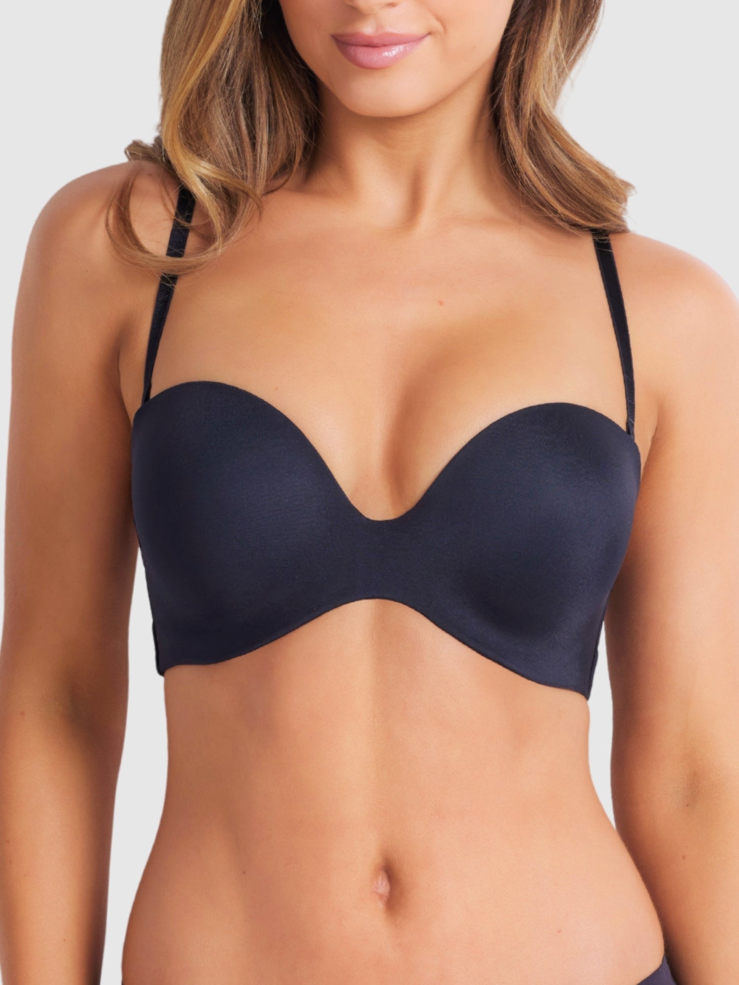 Front view of black strapless plunge bra with smooth finish and supportive structure.