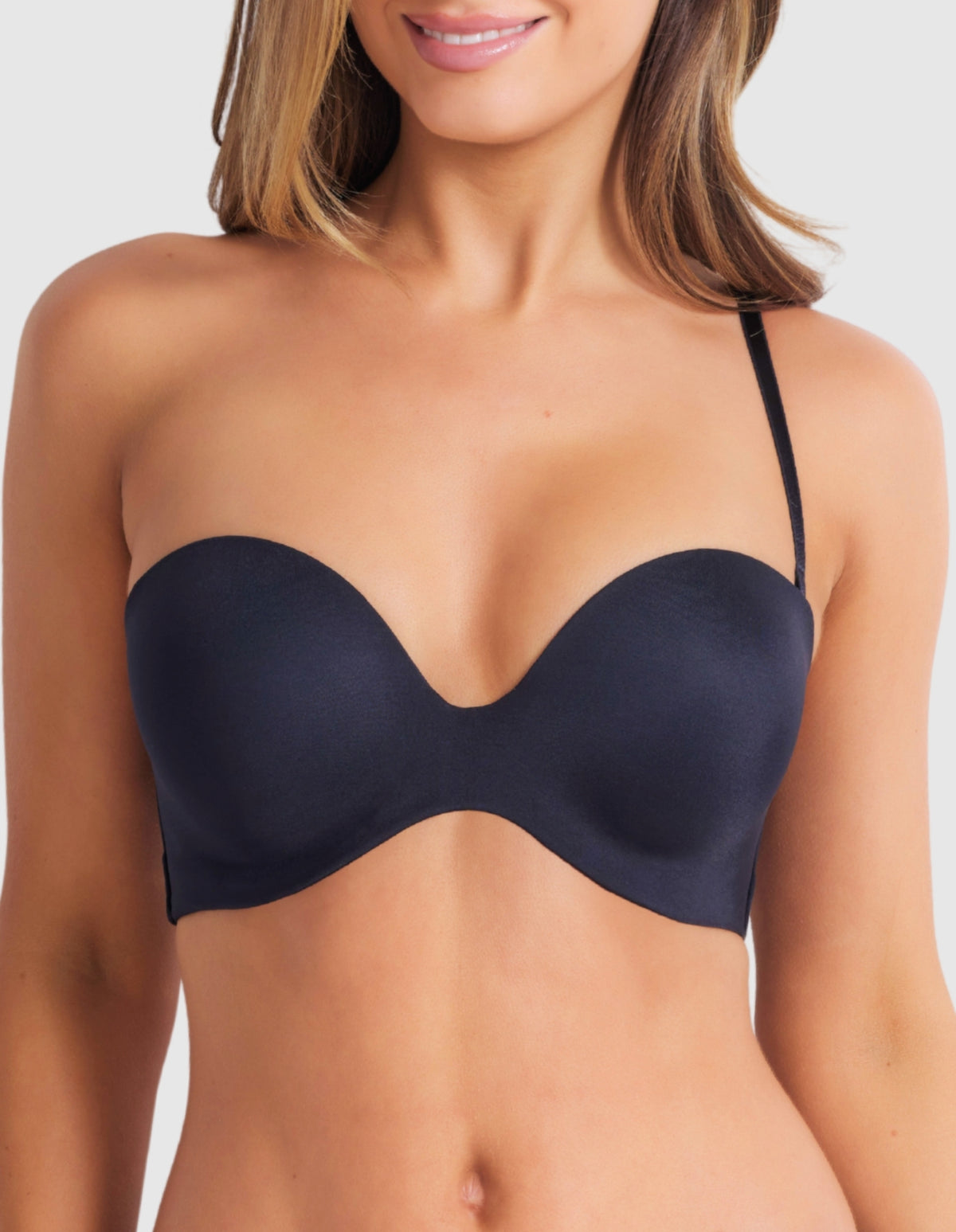 Black one-strap plunge bra styled for asymmetrical outfits with low-cut neckline.