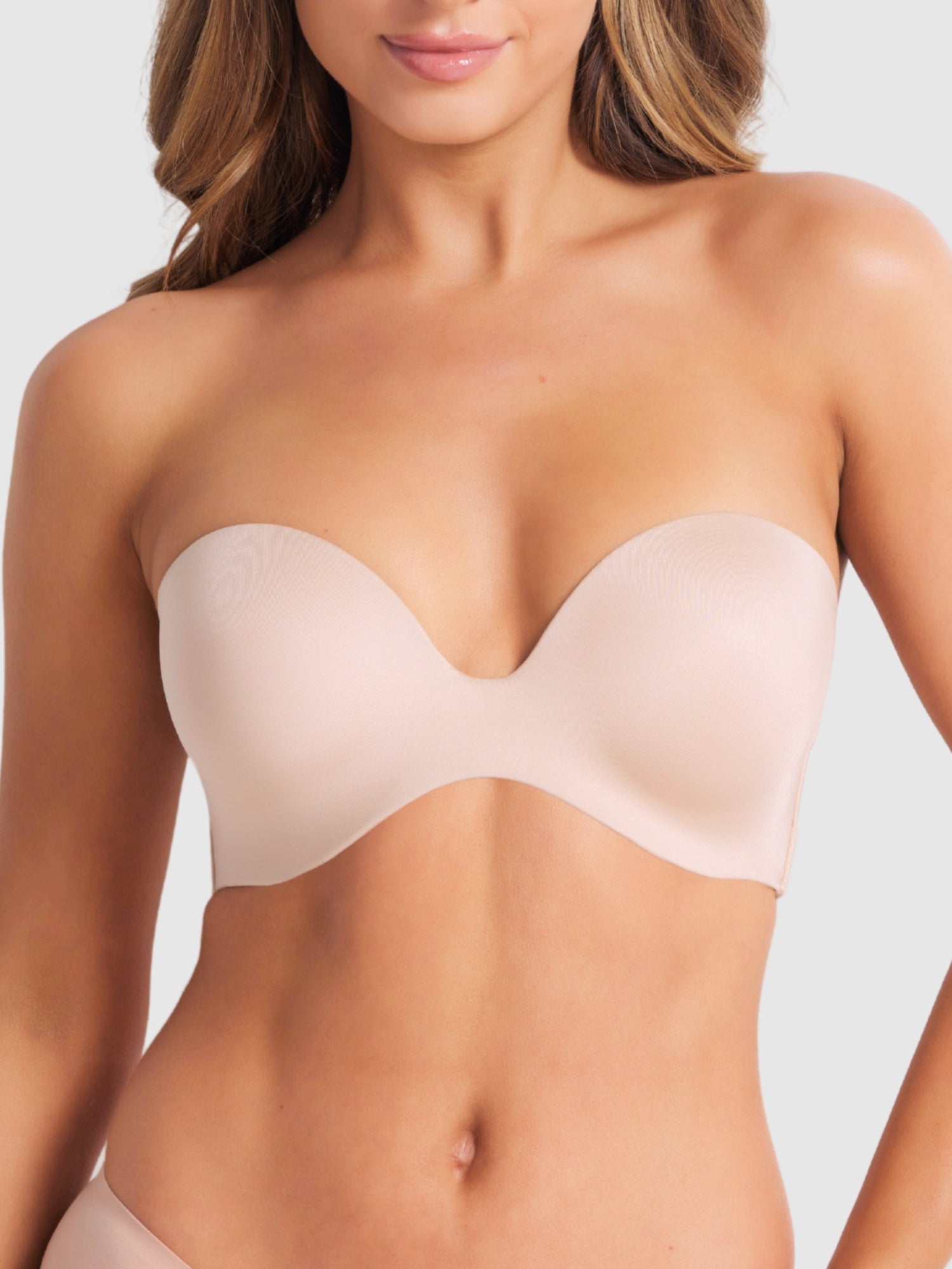 Front view of Attitude Full Figure Strapless Bra in Caramel strapless plunge bra with moulded cups and sculpted neckline.