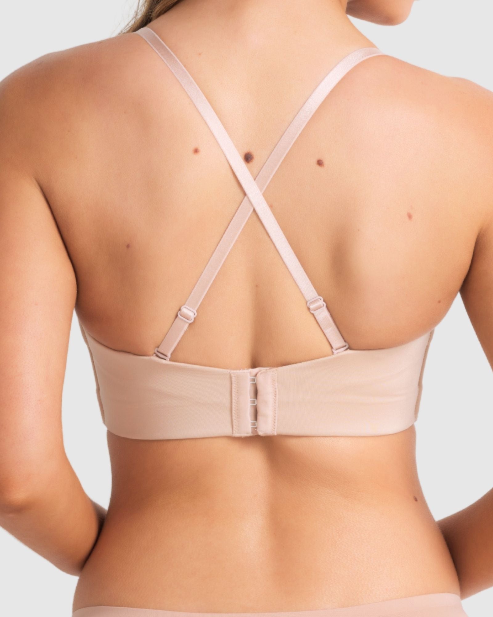 Front view of Attitude Full Figure Strapless Bra in Caramel strapless plunge bra with moulded cups and sculpted neckline.