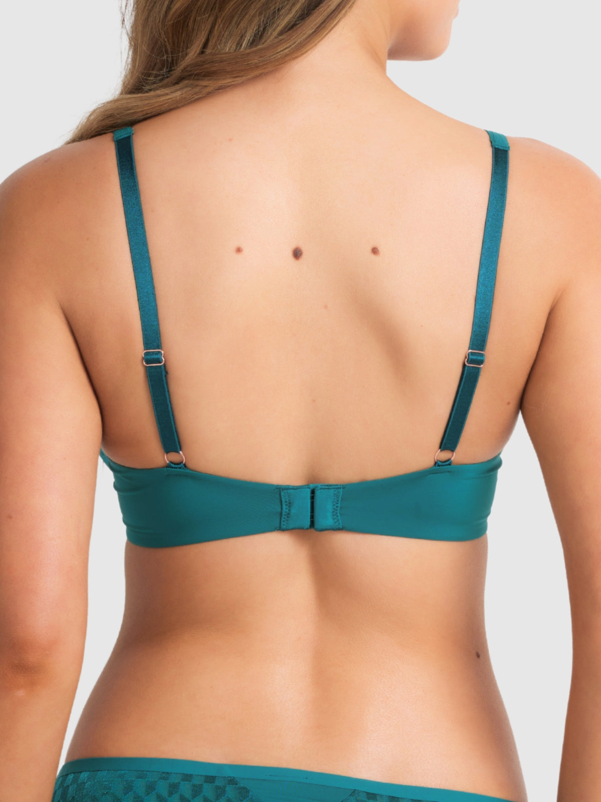 Back view of the Pacific Green plunge bra with adjustable straps and hook closure.