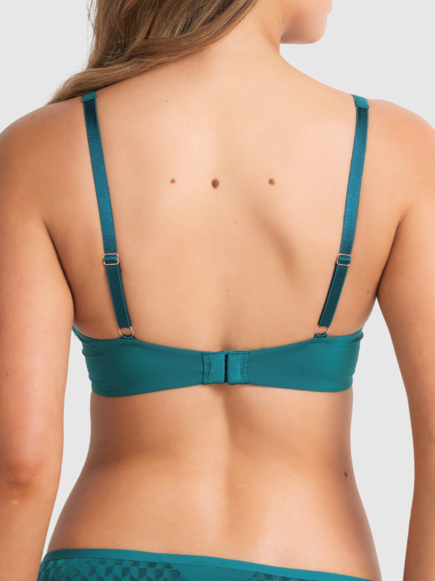 Front view of the Graphic Plunge Bra in Pacific Green with sheer mesh and deep V neckline.