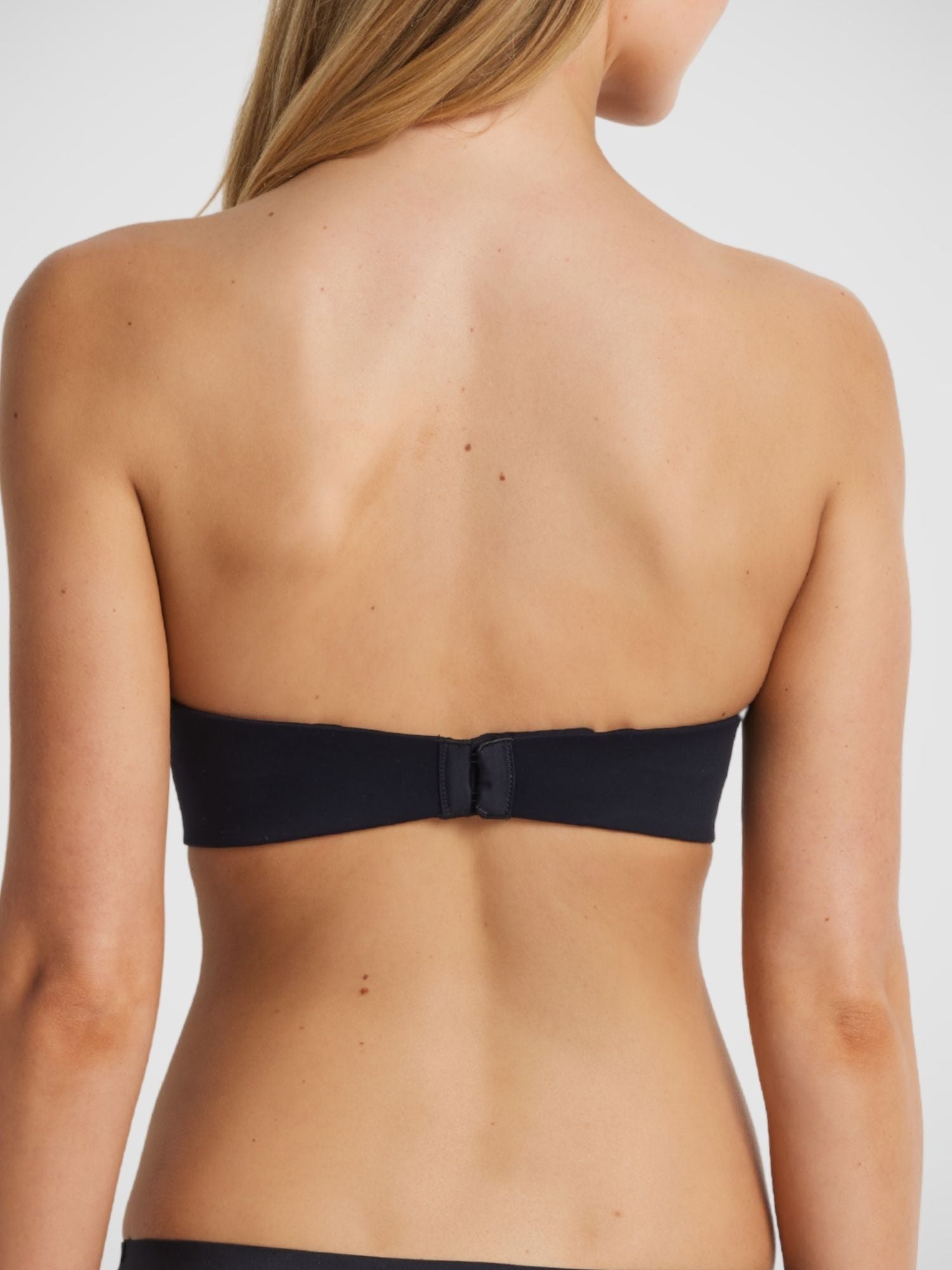 Memory Strapless Bra in Black, non-crease memory foam strapless bra wide wing elastic, model Milla front view