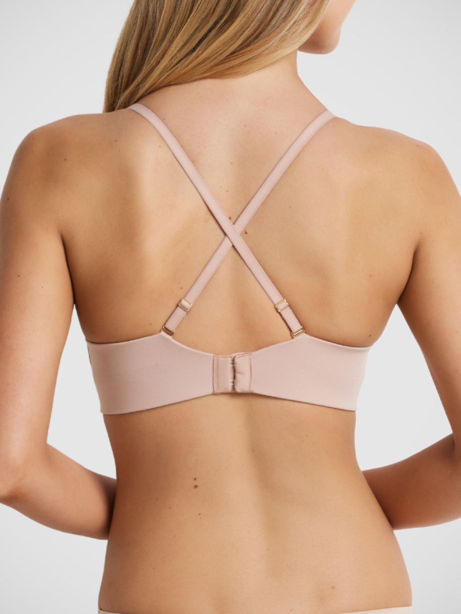 Memory Strapless Bra in Warm Taupe, non-crease memory foam strapless bra wide wing elastic, model Milla front view