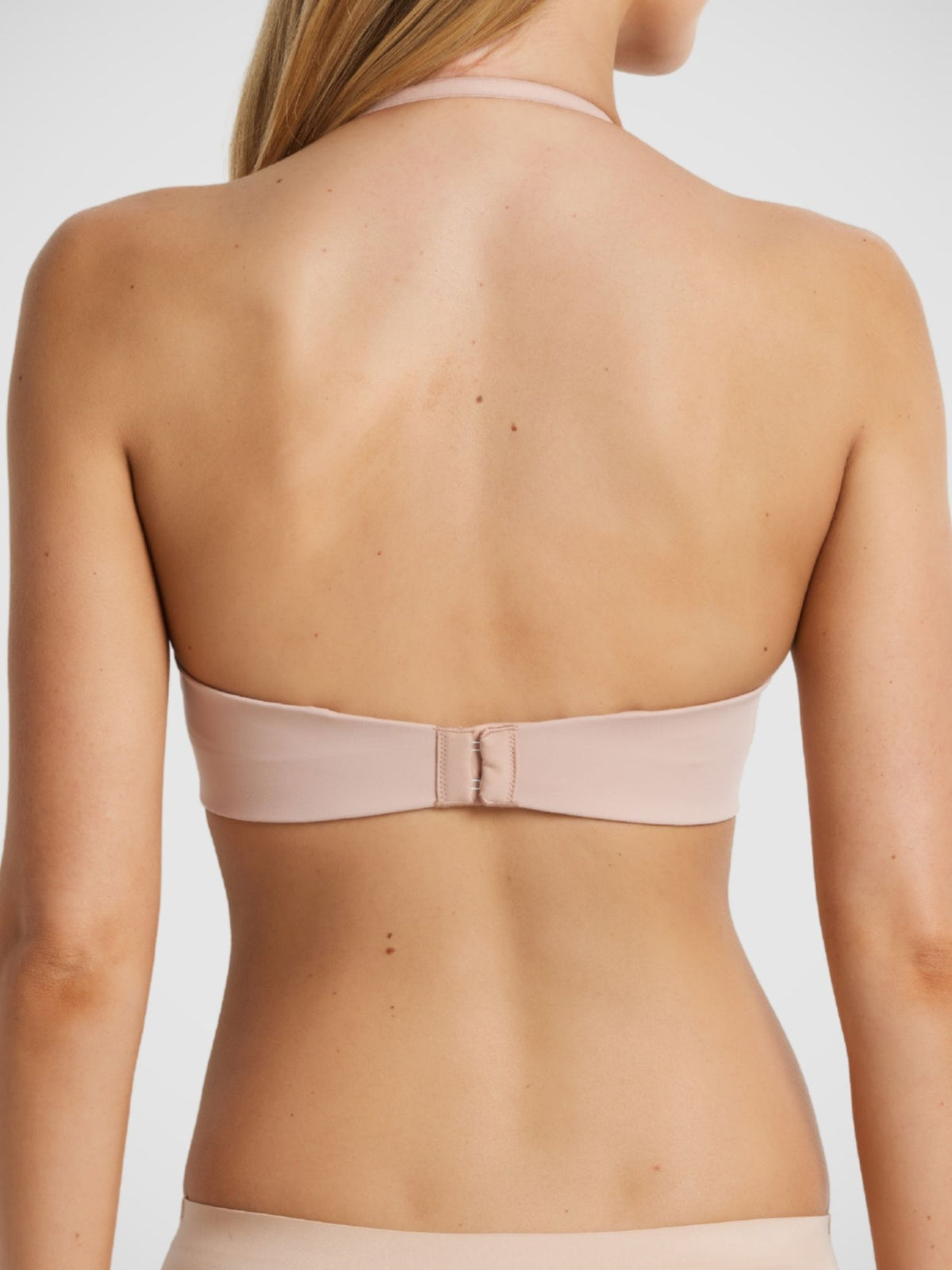 Memory Strapless Bra in Warm Taupe halter strap configuration back view, convertible strapless bra, gold hardware