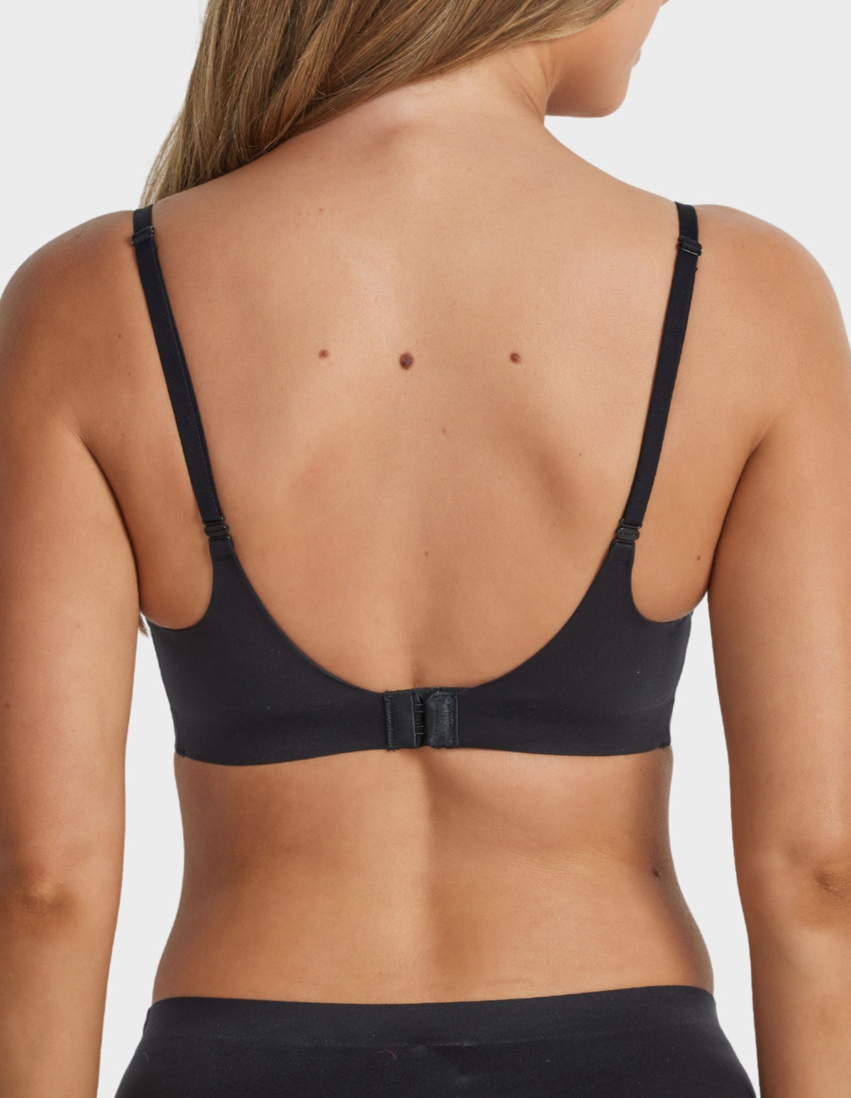 Back view of Fine Lines Ultrasoft Plunge Wirefree Bra in Black with adjustable straps