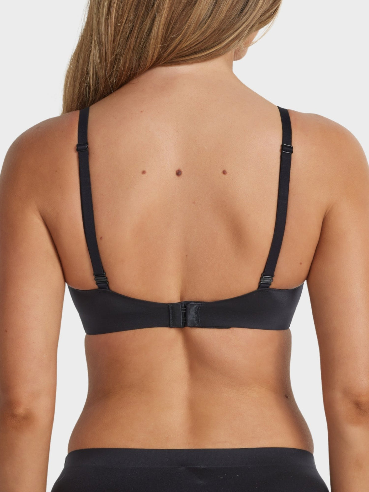 Back view of Fine Lines Ultrasoft Full Coverage Wirefree Bra in Black with adjustable straps