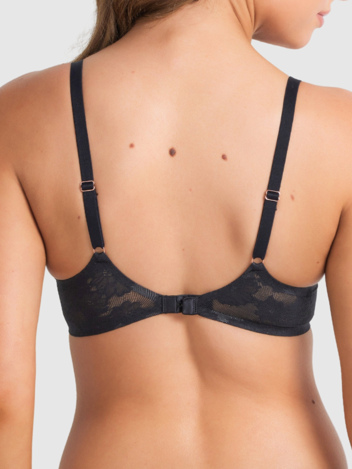 Back view of black plunge bra showing hook-and-eye closure and adjustable straps.