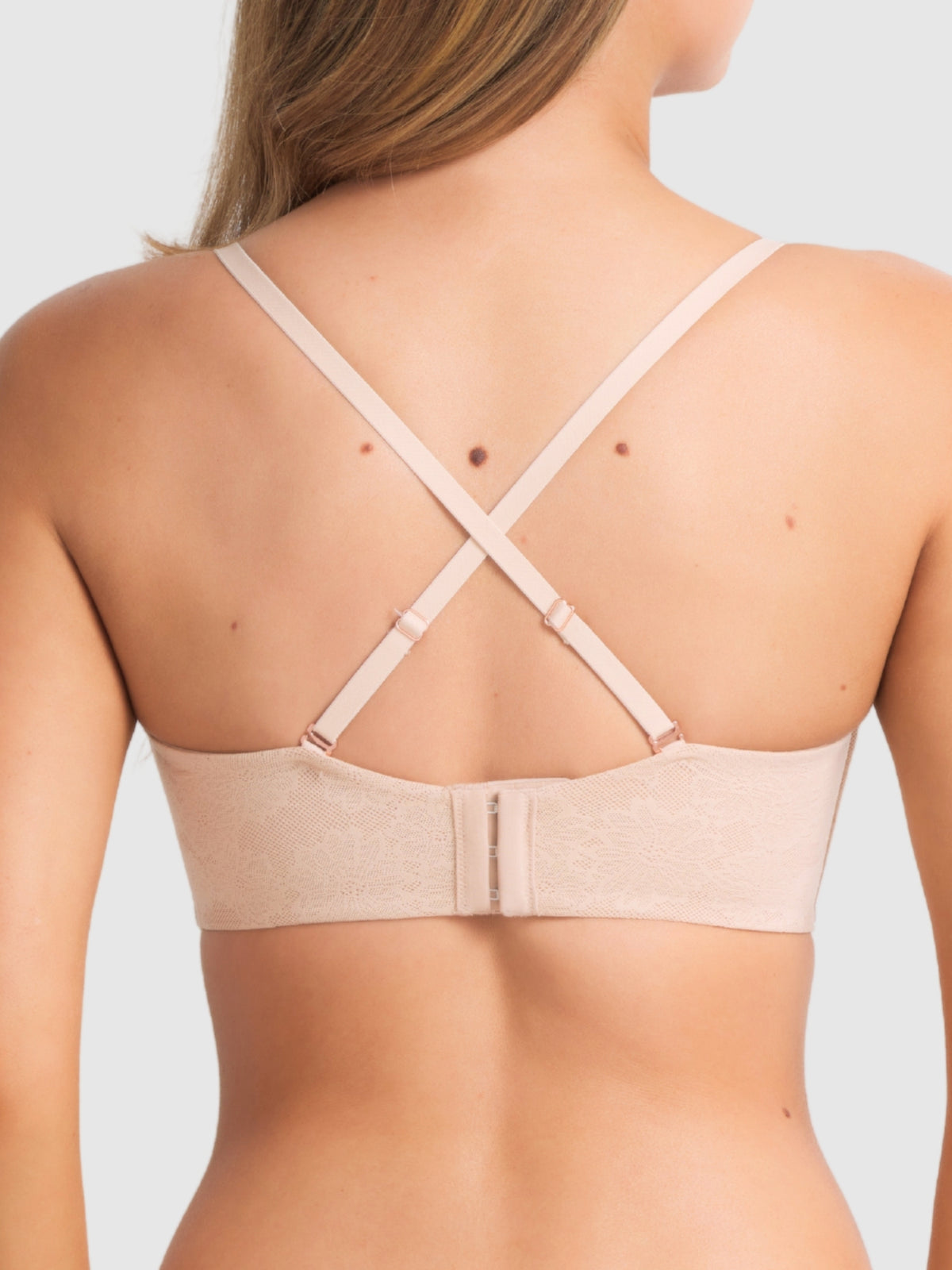 Back view of the bra converted to criss-cross strap style, emphasising strap adjustability and support.